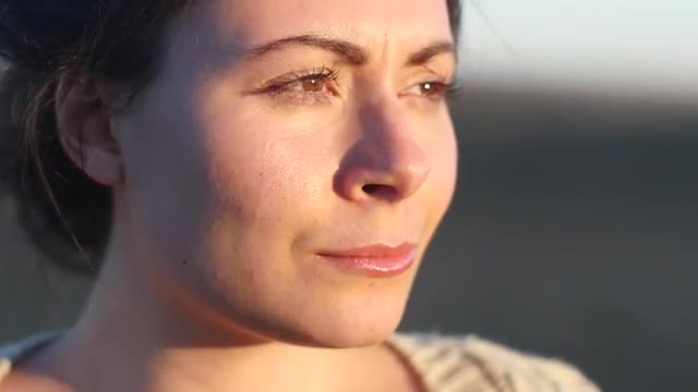 Woman Looking Out Into The Sun #1 