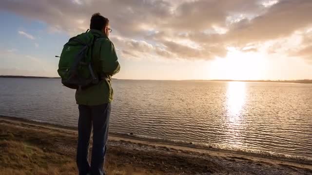 Guy Looking Into The Sunset