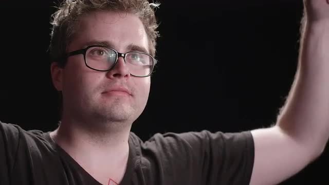 Odd man pretending to pump arms up and down