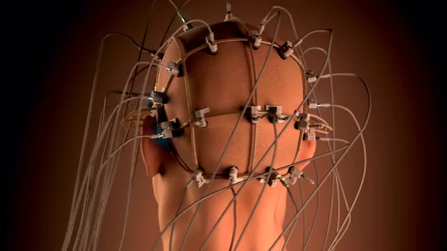 Man wired to an EEG machine