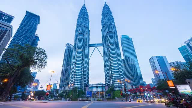 Night to day time lapse of Kuala Lumpur city during rush blue hour