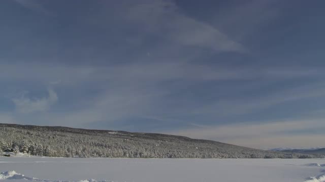 Empty, frozen lake and Winter landscape in the mountains of central Norway, near Geilo.
