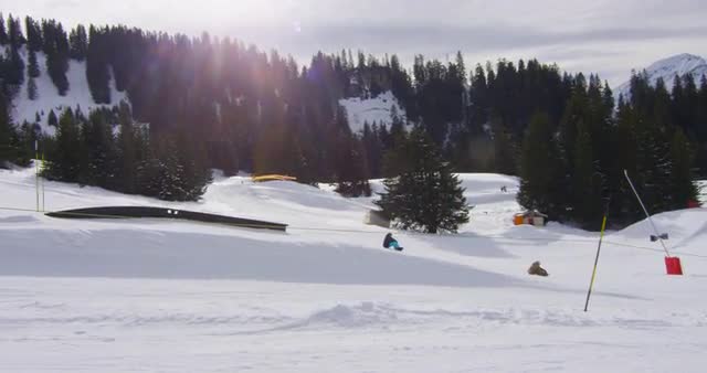 Steady shot from snowmobile - Ski resort - 4K