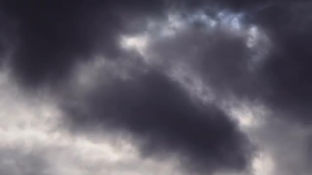 Circle the sun in overcast cloud