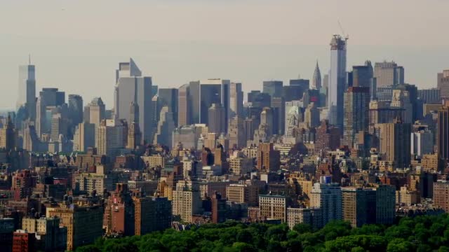 WIDE AERIAL PAN of Midtown Manhattan skyline from Central Park