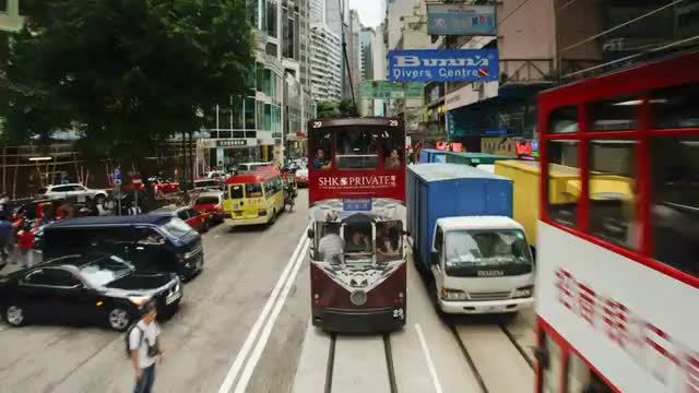POV - Trams which run in Central Hong Kong Island along Connaught Road, China, Asia - T/Lapse