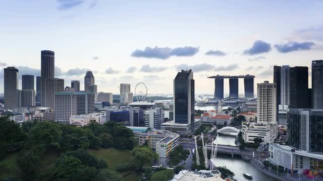 Elevated view over the Entertainment district of Clarke Quay, the Singapore river and City Skyline,