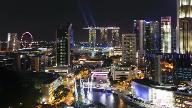  Elevated view over the Entertainment district of Clarke Quay, the Singapore river and City Skyline,