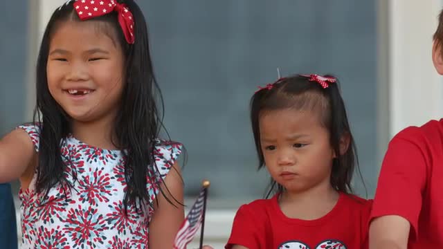 Children waving American flags, shot on Phantom Flex 4K