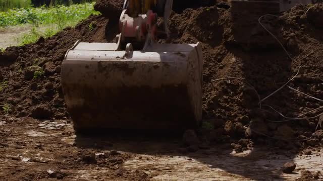 Closeup shot of excavator digging