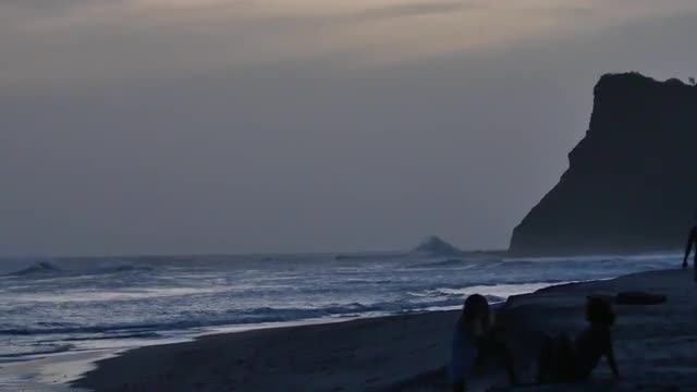 Couple sitting on beach