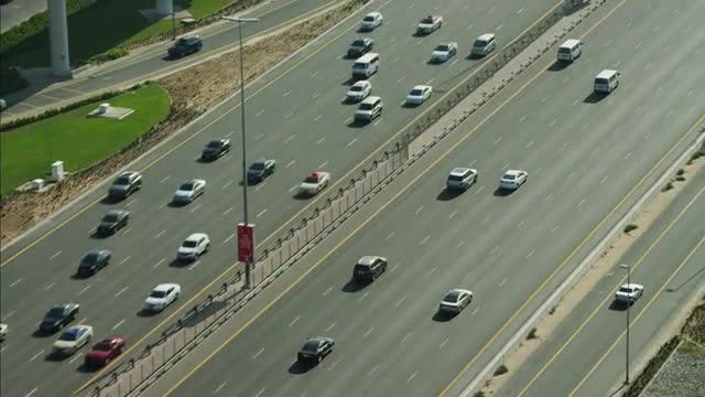 Aerial Dubai City Sheikh Zayed Road traffic multi lane UAE