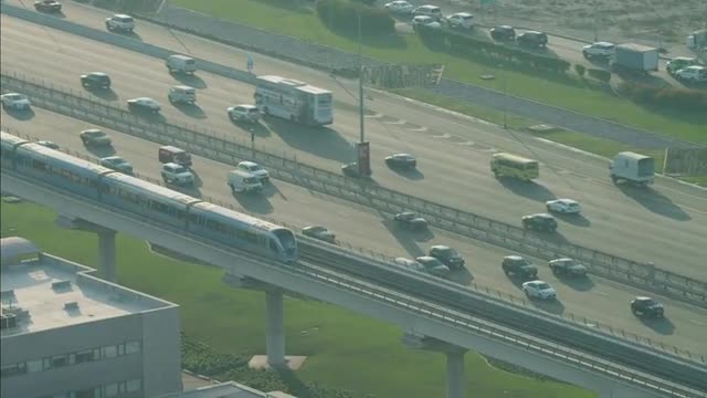 Aerial train motion Dubai Metro Rail Sheikh Zayed Road UAE Aerial train motion Dubai Metro Rail Sheikh Zayed Road UAE