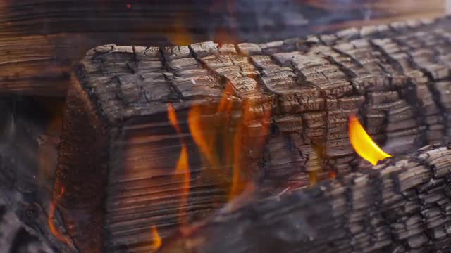 Wood burning in campfire. Shot on RED EPIC for high quality 4K, UHD, Ultra HD resolution.