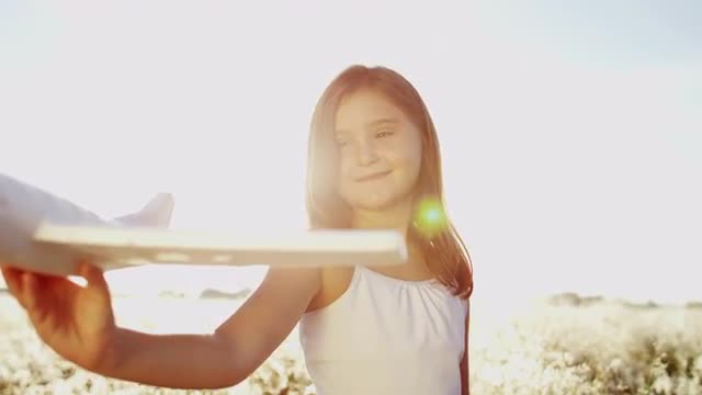 Happy Caucasian Girl Simple Toy Play Airplane Future Dreams Aspirations Outdoors