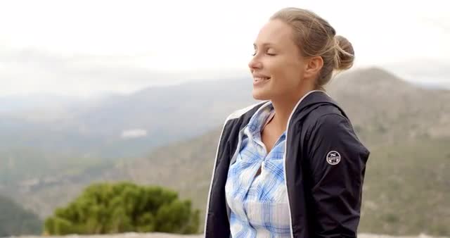 Portrait of Blond Woman, She Enjoys Mountain