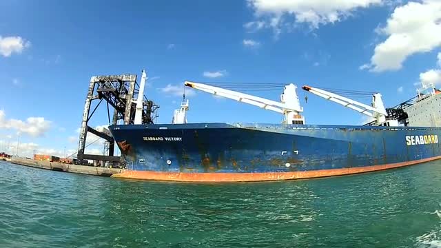 Container vessel moored dockside Port of Miami, USA