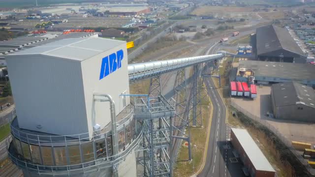 Conveyor belt machinery at port drone shot