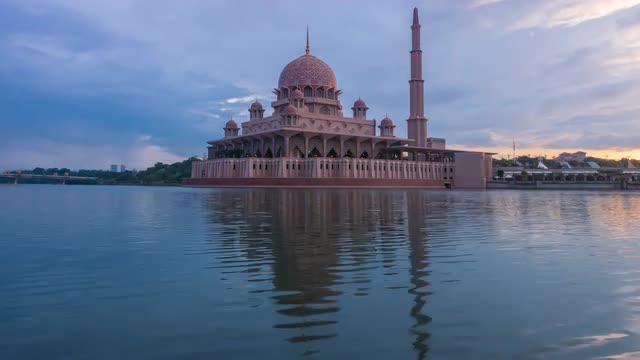Sunrise Time Lapse at a Mosque by a Lake.