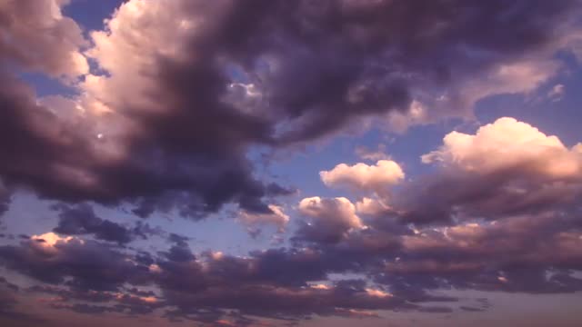 Purple and Blue Clouds Moving Slowly