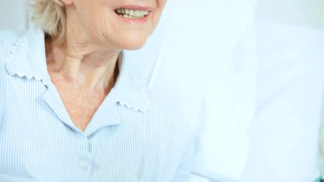 Female Patient Hospital Bed Reassured Caring Relative