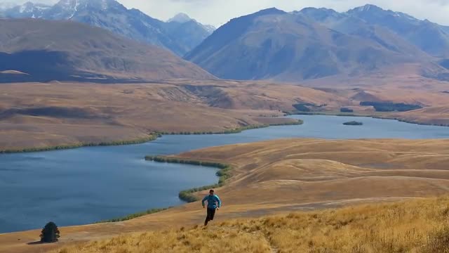 A man running at Lake Tekapo