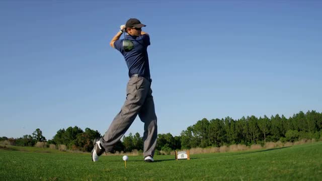 Golfer Practicing Swing Golf Resort Fairway