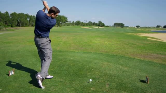 Caucasian Male Practicing Swing Golf Course 