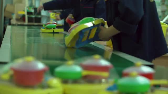 Toy Factory Workers Pack Products and Pack it in