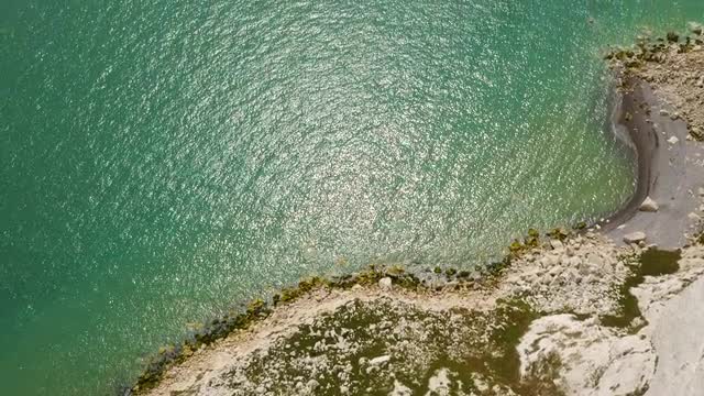 Tilting aerial drone footage of Seven Sisters / Beachy Head lighthouse 