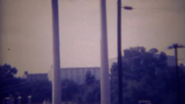 1966: Kentucky Gentleman bourbon whiskey distillery production factory smokestacks.