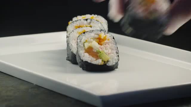 07_22_15_Chef_Serving_Sushi