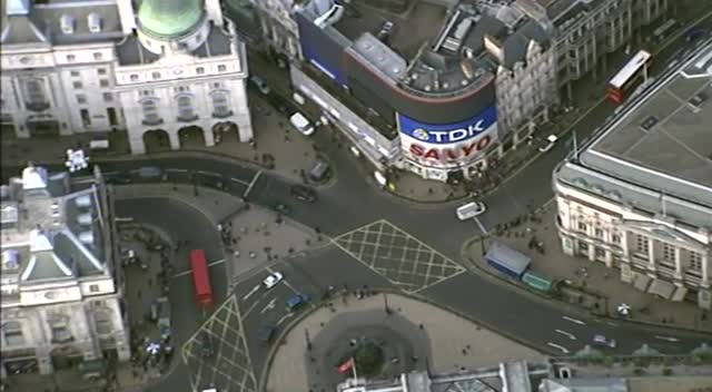 Aerial shot Piccadilly Circus London camera rotates and zooms in