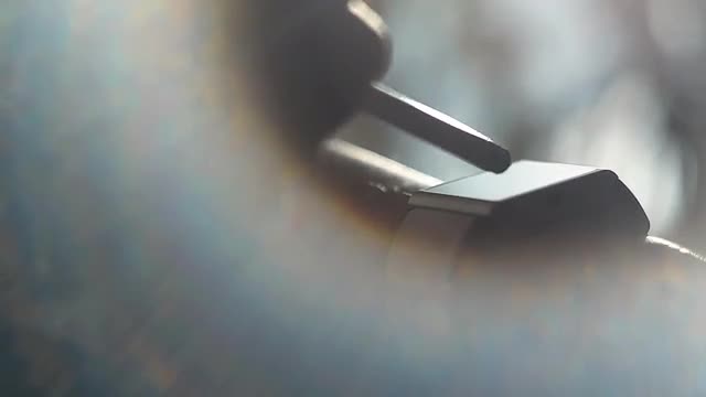 Woman Using A Smart Watch With Stylus