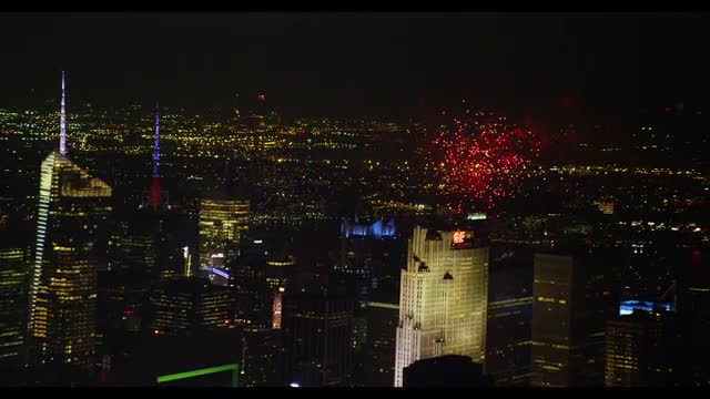 Close up Fireworks, pull back, Empire State, Bank America buildings