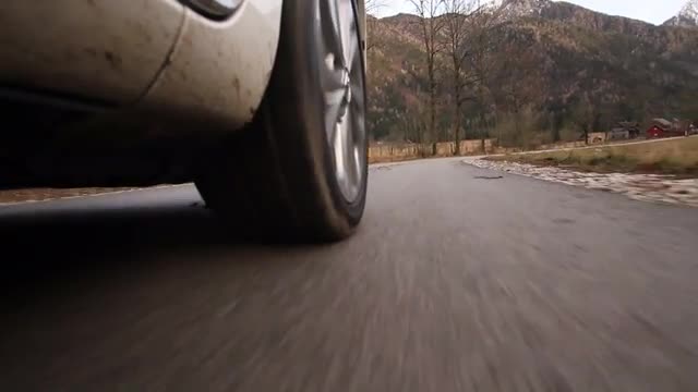 Car wheel on mountain road