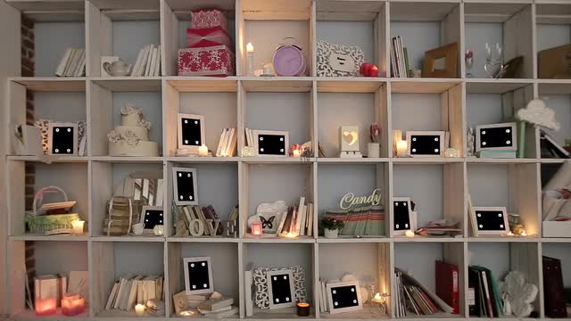 Mockup Video Displays Framework for Phototography are on the Shelf