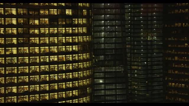 Close up building windows at night, Flying between buildings