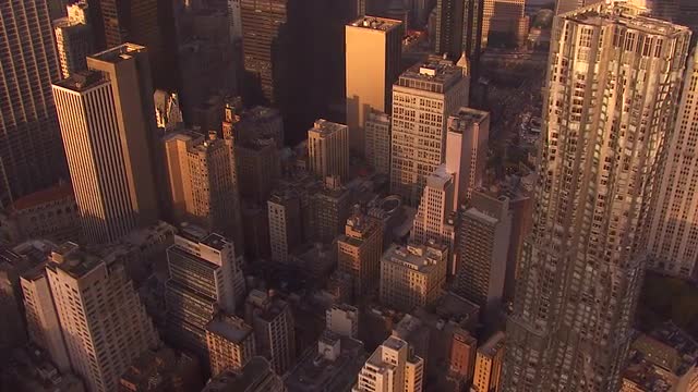 Midtown sweeping shot, Beekman Tower, sunset reflect on buildings
