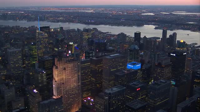 Midtown, slow sweeping shot, dusk