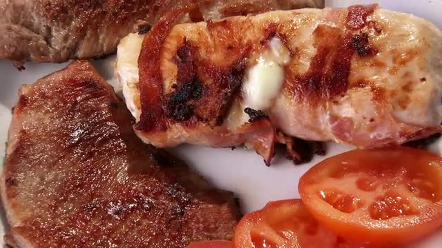 Steak, white chicken meat rolled with bacon