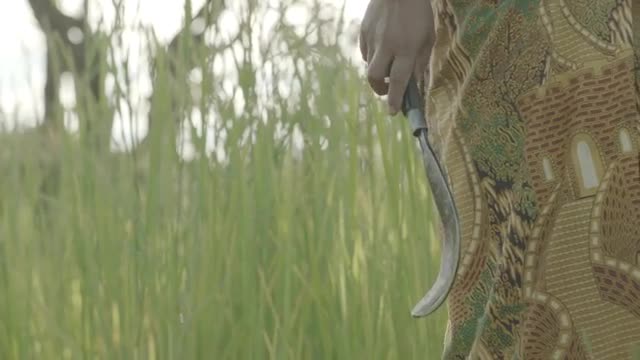 Nepali Woman Holding Knife