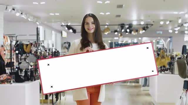 48_48_15_Woman_Holding_Mock_sign_in_Clothing_store