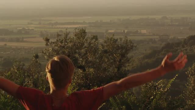 Man and Raising Hands in Nature. 
