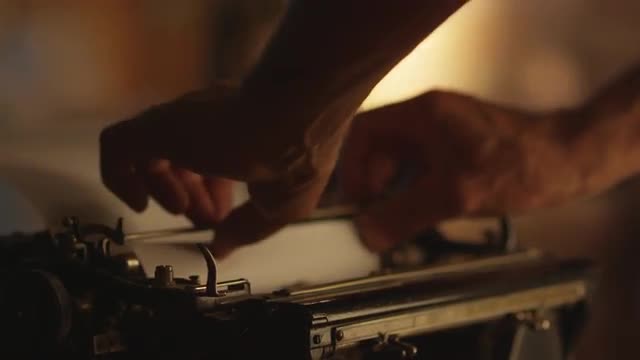 Putting_a_paper_into_typewriter