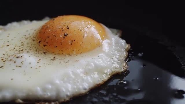 Cooking eggs in a pan