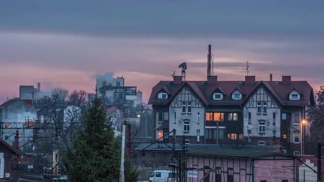 Residental House Crane is Working Factory Hyperlapse Titelapse Smoke is Raising Up from a Pipe Cloud