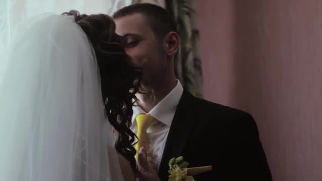 Newlyweds Kiss in Hotel. Wedding day.