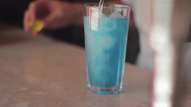Bartender preparing a cocktail.