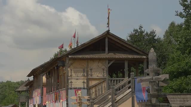 Wooden Observation Building With a Flags Near the Stadium, Signpost, Guidepost,trees